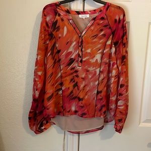 Orange, pink, and black Calvin Klein blouse. Size L